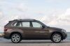2013 BMW X5 xDrive50i in Sparkling Bronze Metallic from a right side view
